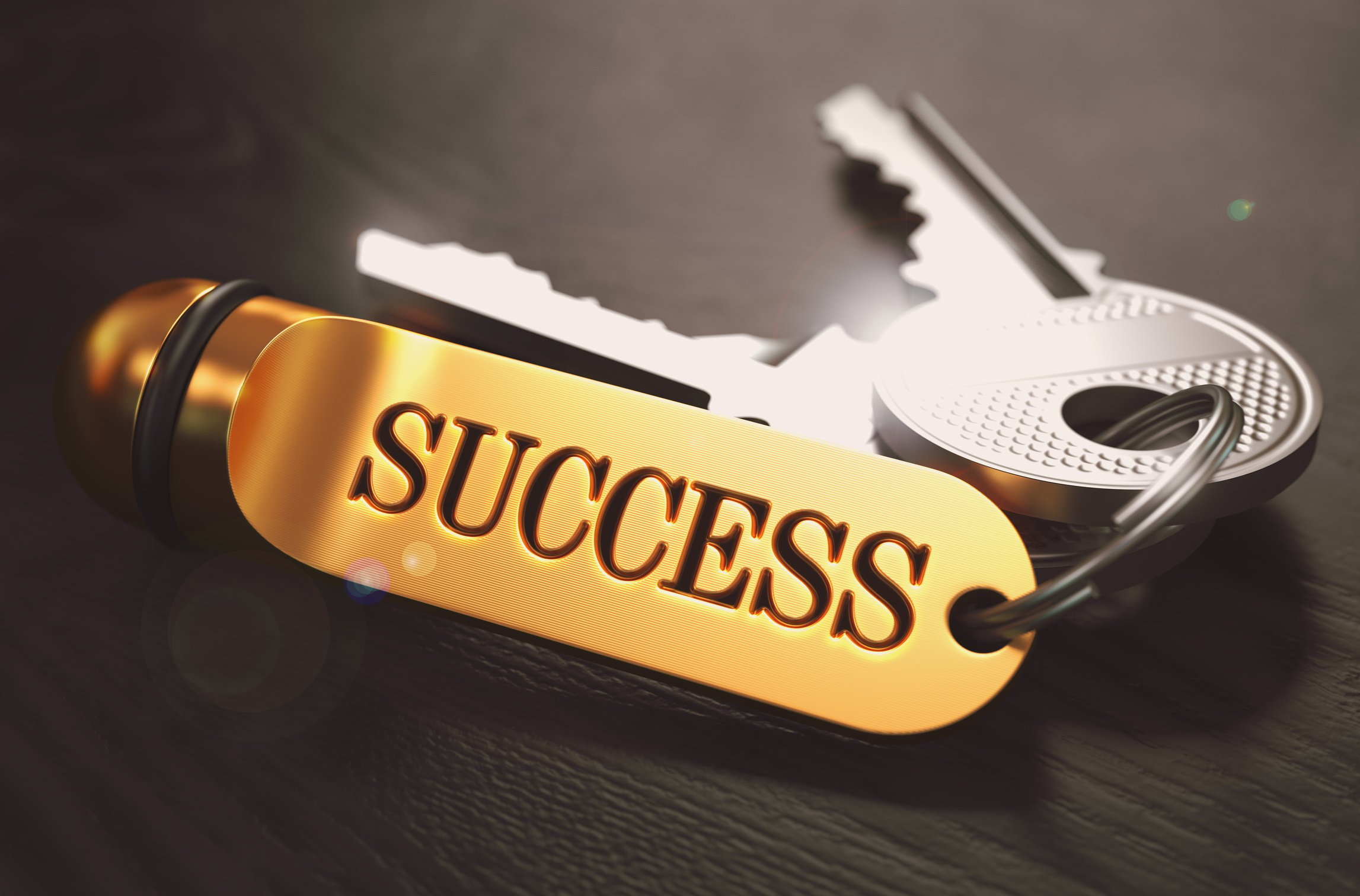 Keys to Success. Concept on Golden Keychain